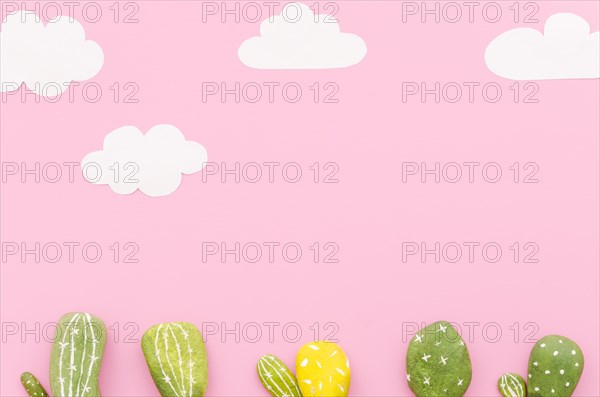 Small cactuses with paper clouds table. Resolution and high quality beautiful photo