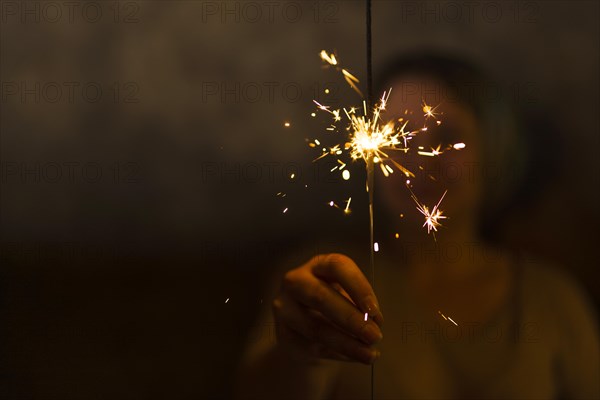 Woman holding flaming bengal light. Resolution and high quality beautiful photo