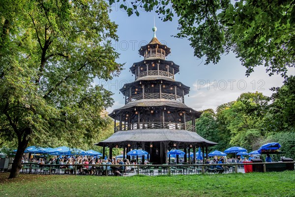 Beer garden at the Chinese Tower in the English Garden in the evening sun