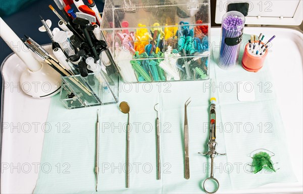 Dentist tools on the table. Top view of stomatologist tools on table. Set of dental tools on dentist's panel. Close up of dental tools on dentist table