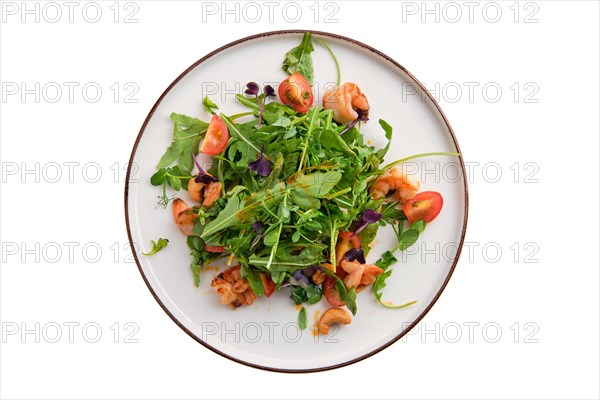 Salad with shrimps and fresh vegetables isolated on white background