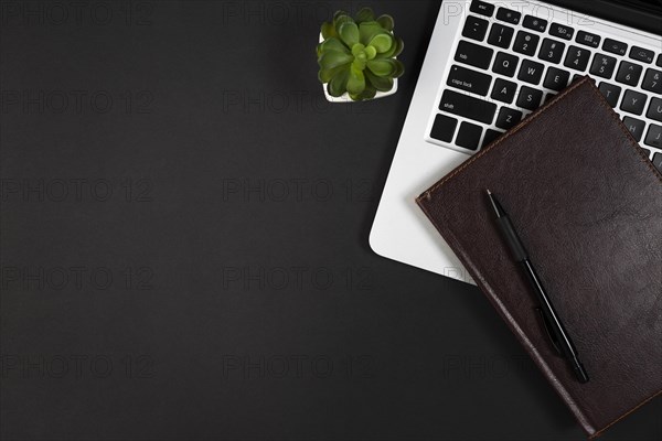 Flat lay desk dark concept with copy space