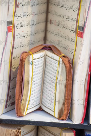 Islamic Holy Book Quran on the market shelf