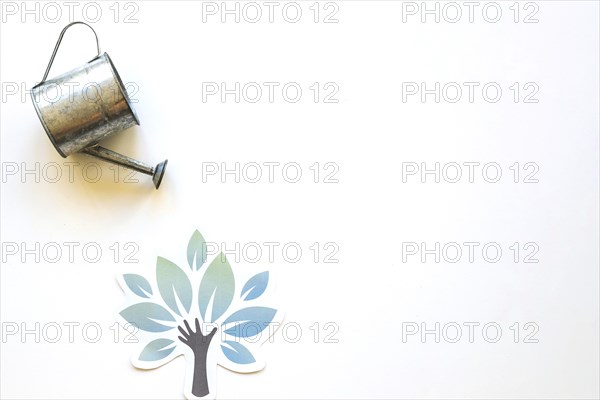 Watering pot paper tree. Resolution and high quality beautiful photo