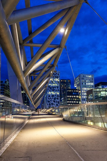 Oslo skyline modern city architecture building with bridge in Barcode District at night in Oslo