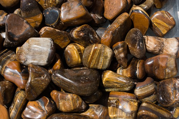 Tiger's eye and hawk's eye gemstone as natural mineral rock specimen