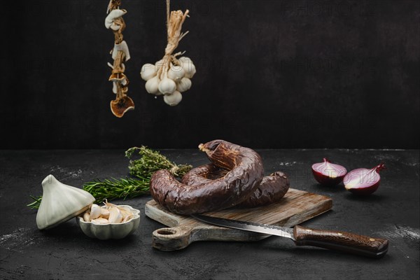 Organic blood pudding on cutting board