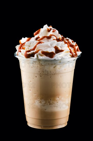 Caramel milkshake in take away cup isolated on black background