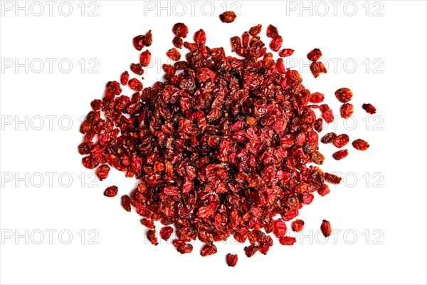 Heap of dry barberry on white background