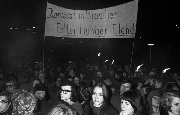 Several hundred students from the University of Duesseldorf gathered in front of the Hilton Hotel in 1971 to protest a banquet in the face of hunger and oppression in Brazil