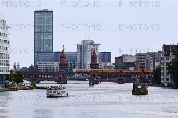 Spree with Oberbaum Bridge and Treptowers high-rise