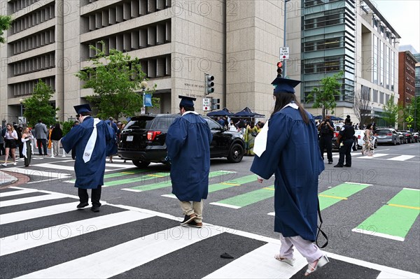 College students of George Washington University in the traditional robe and mortarboard on their graduation day