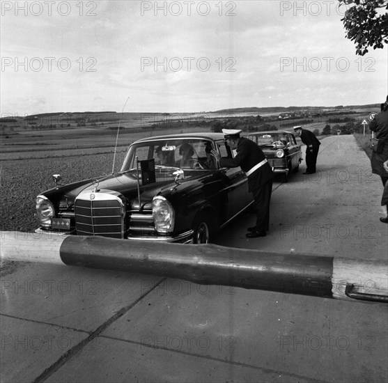 Government representatives with their vehicles in 1966 during a police check at the hitherto secret atomic bunker of the Federal Government in the Ahr valley