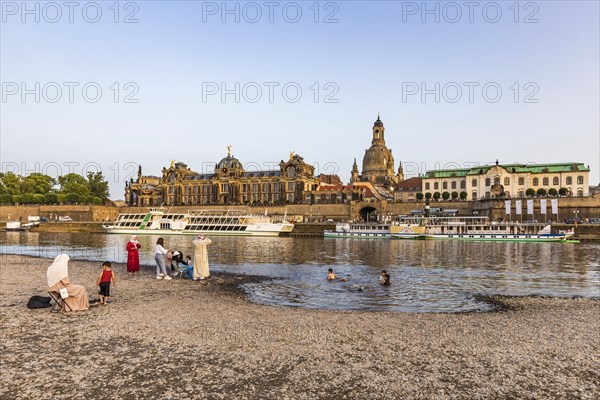 Bathing children on the Elbe beach and the Bruehl Terrace with paddle steamer