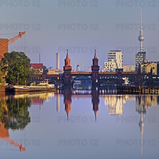 Spree in the early morning with Oberbaum Bridge and TV Tower