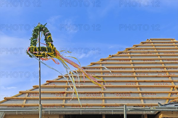 Topping-out wreath at a topping-out ceremony for a single-family house