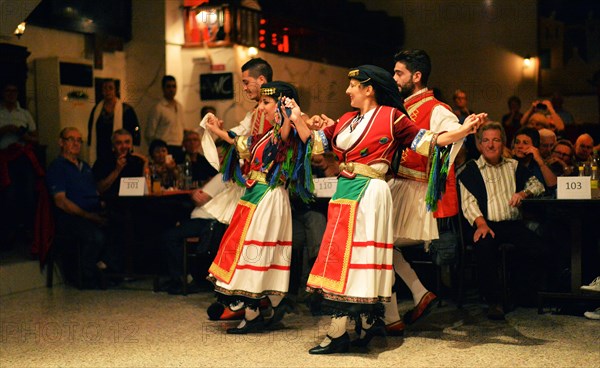 Tourists encounter impressive evidence of Roman and Greek history on a round trip through western Turkey and to the Greek island of Rhodes. The picture shows: Folk dance group in front of and with tourists on the island of Rhodes in Rhodes