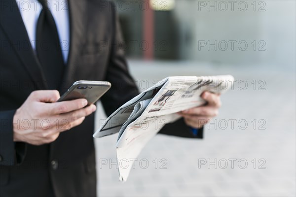 Business man using his mobile phone