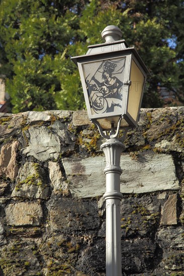 Street lamp with historical figure