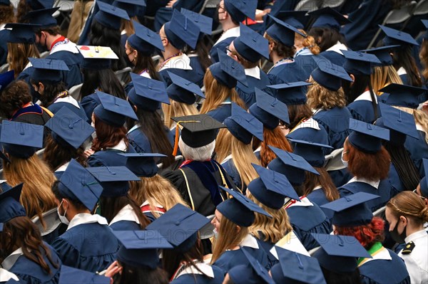 College students of George Washington University in the traditional robe and mortarboard on their graduation day