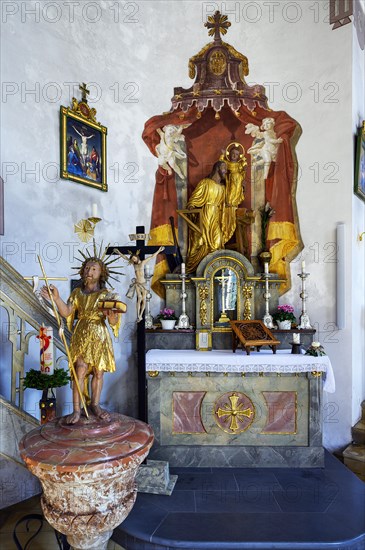 Side altar with baptismal font