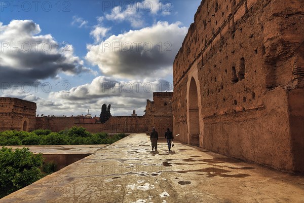 Pedestrians in the ruins