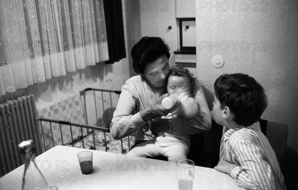 The work of a housewife and mother shopping for groceries at the supermarket and Aldi