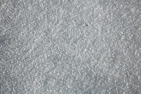 Structure with snow with ice crystals