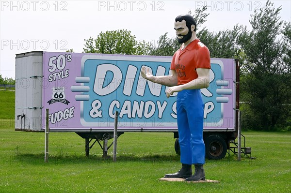 Harley Davidson man statue in front of the Pink Elephant Antique Mall