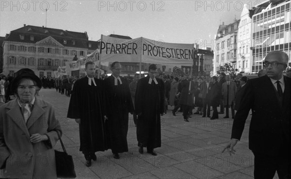 Those who support the Vietnam War betray the gospel of love. Pastors protest. With these slogans and sometimes wearing their robes