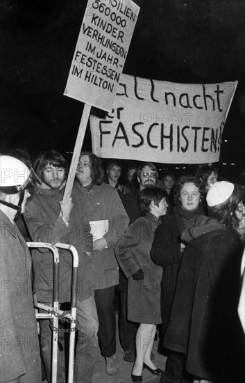 Several hundred students from the University of Duesseldorf gathered in front of the Hilton Hotel in 1971 to protest a banquet in the face of hunger and oppression in Brazil