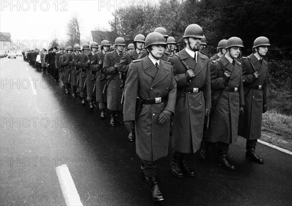 A meeting of the traditional associations of the Waffen- SS to honour their dead of the 6th SS Division North on 14. 11. 1971 in Hunrueck was accompanied by the Bundeswehr with officers and a squad of recruits