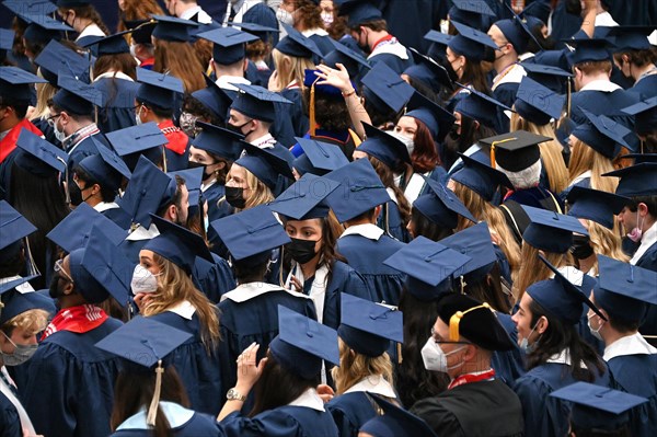 College students of George Washington University in the traditional robe and mortarboard on their graduation day