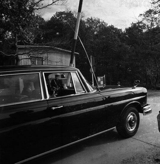 Government representatives with their vehicles in 1966 during a police check at the hitherto secret atomic bunker of the Federal Government in the Ahr valley