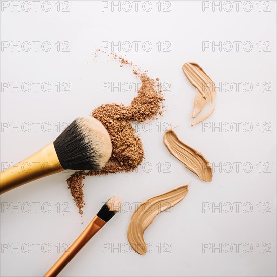 Brushes near powder concealer