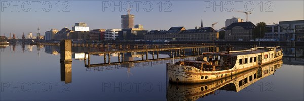 Shipwreck of the MS Dr. Ingrid Wengler in the Spree in early morning light