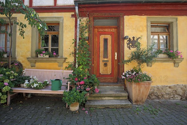 Idyllic house facade with flower decoration