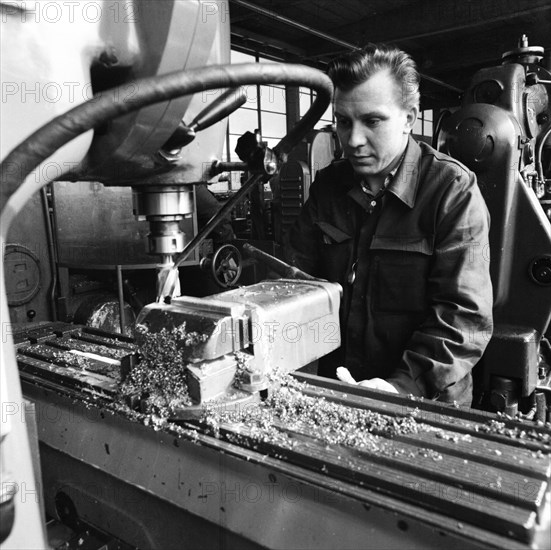 Older workers are retrained in metal trades as locksmiths and lathe operators in the Krupp AG workshops in Bochum in 1967