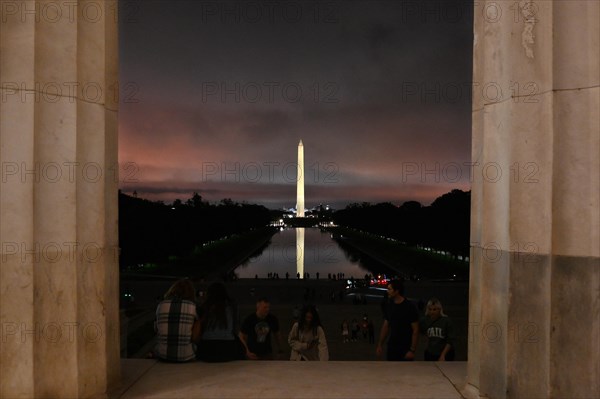 Washington Monument and Reflecting Pool on the National Mall at night