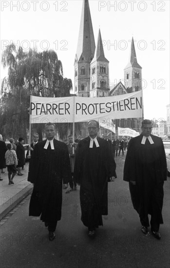 Those who support the Vietnam War betray the gospel of love. Pastors protest. With these slogans and sometimes wearing their robes