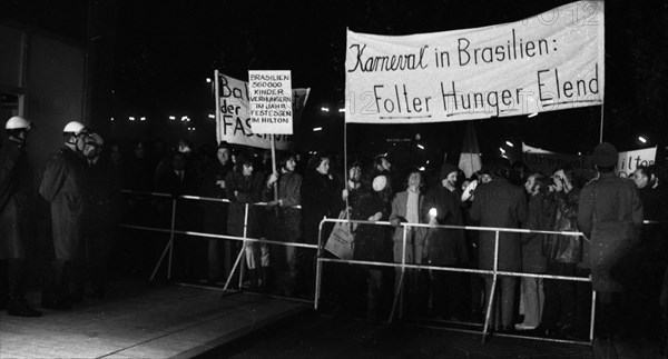 Several hundred students from the University of Duesseldorf gathered in front of the Hilton Hotel in 1971 to protest a banquet in the face of hunger and oppression in Brazil