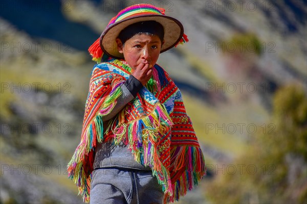 Boy in traditional dress of the Quechua Indians
