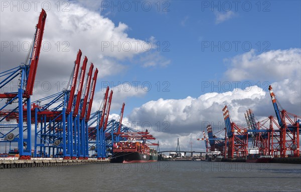 Container ship being loaded in the container port of Hamburg