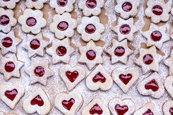 Freshly baked Spitzbuben in the shape of a heart