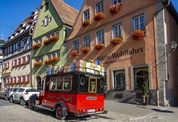 Decorated vintage bus in front of the house of Kaethe Wohlfahrt Christmas Village