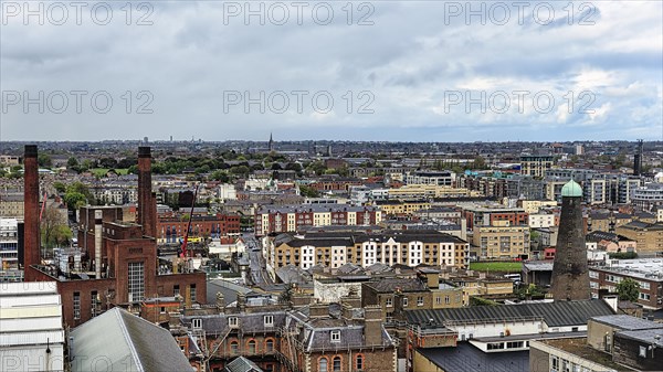 Panoramic view of the city's houses and rooftops from the rooftop bar