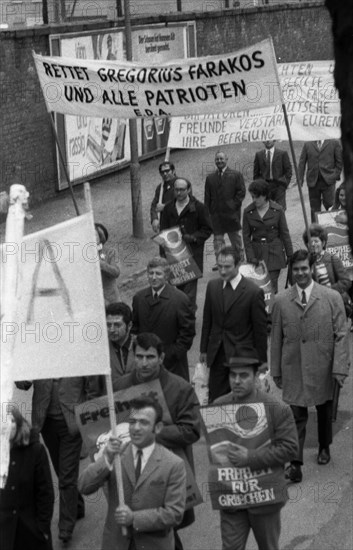 A demonstration with folklore elements in Duesseldorf on 25. 5. 1971 against the rule of a military junta and for democracy in their country by Greek guest workers and Germans