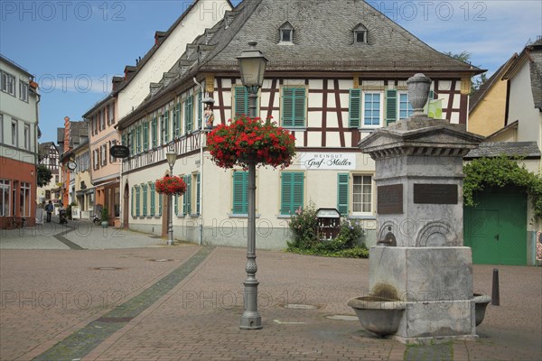 Bischof Blum Platz with Longfellow Fountain and Half-half-timbered house House Graf Mueller Winery