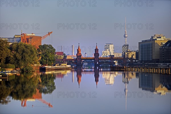 Spree in the early morning with Oberbaum Bridge and TV Tower