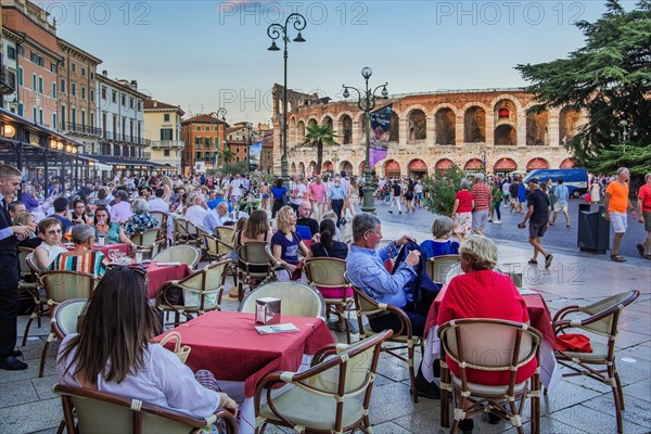 Restaurant terraces in Piazza Bra in front of the Arena di Verona